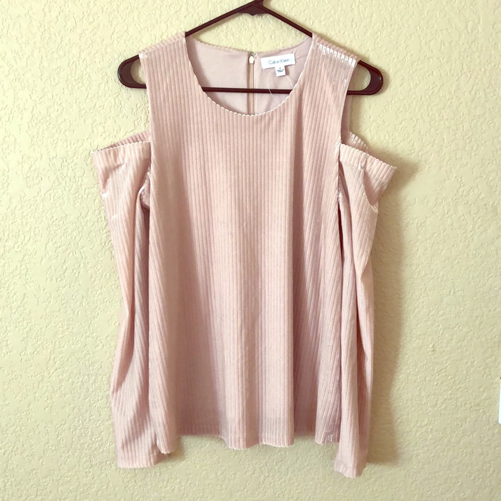 Calvin Klein light pink shirt.